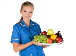 woman holding fruits